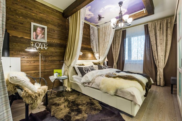 спальня с деревянными стенами